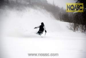 NOASC Iwanai CAT skiing client enjoying his turns